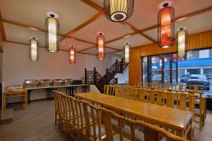 Ancient Dream Hotel餐厅或其他用餐的地方