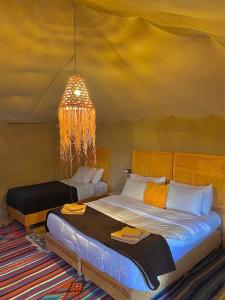 Ένα ή περισσότερα κρεβάτια σε δωμάτιο στο Desert Campo