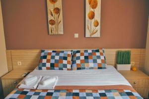 Ένα ή περισσότερα κρεβάτια σε δωμάτιο στο Hotel Bulevar