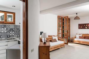 Ένα ή περισσότερα κρεβάτια σε δωμάτιο στο Villa Massidda