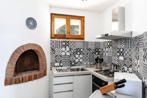 Η κουζίνα ή μικρή κουζίνα στο Villa Massidda
