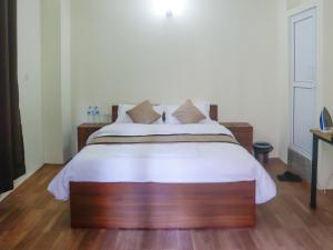 Katil atau katil-katil dalam bilik di Zen Nest Hotel