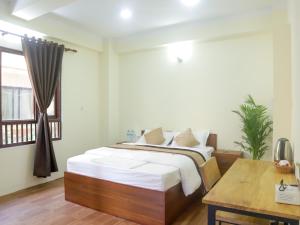 Katil atau katil-katil dalam bilik di Zen Nest Hotel