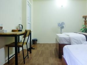 Katil atau katil-katil dalam bilik di Zen Nest Hotel
