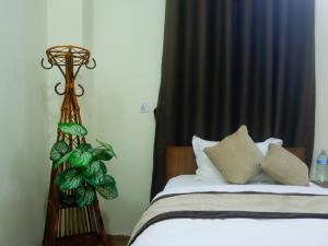 Katil atau katil-katil dalam bilik di Zen Nest Hotel