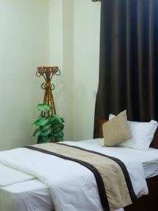 Katil atau katil-katil dalam bilik di Zen Nest Hotel