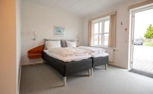 Voodi või voodid majutusasutuse Hotel Korning toas