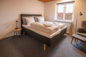 Voodi või voodid majutusasutuse Hotel Korning toas