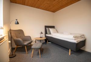 Postel nebo postele na pokoji v ubytování Hotel Korning