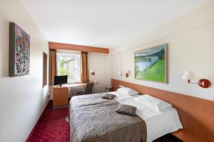Postel nebo postele na pokoji v ubytování Art City Inn + 37 fotografií