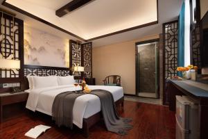 Ancient Dream Hotel客房内的一张或多张床位