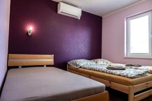 Postel nebo postele na pokoji v ubytování Dom so záhradou