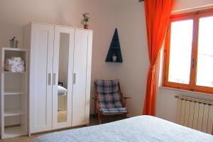 A bed or beds in a room at Casa ViDa Sabaudia