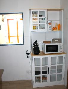 A kitchen or kitchenette at Casa ViDa Sabaudia