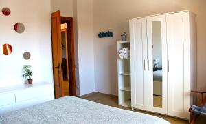 A bed or beds in a room at Casa ViDa Sabaudia