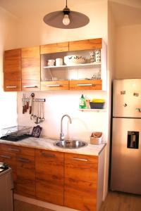 A kitchen or kitchenette at Casa ViDa Sabaudia