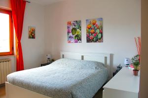 A bed or beds in a room at Casa ViDa Sabaudia