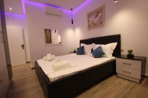 Postel nebo postele na pokoji v ubytování Klea Rooms