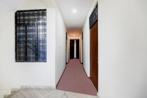 Ένα ή περισσότερα κρεβάτια σε δωμάτιο στο Hotel O George Town