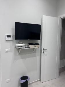 TV a/nebo společenská místnost v ubytování E' bello qui!