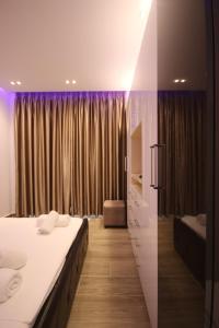 Postel nebo postele na pokoji v ubytování Klea Rooms