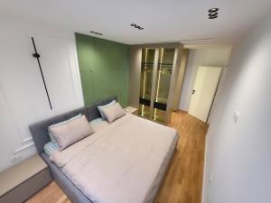 Ένα ή περισσότερα κρεβάτια σε δωμάτιο στο Noema Apartment's