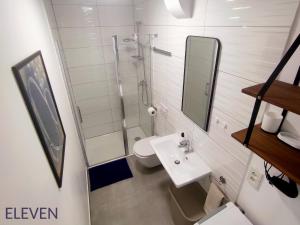 a white bathroom with a sink and a shower at ELEVEN in Šibenik +35 photos