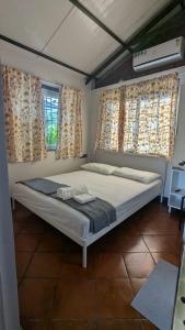Postel nebo postele na pokoji v ubytování Medini Ecostay - Your Private Paradise