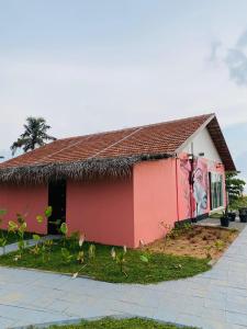 Fotografie z fotogalerie ubytování Beach House Varkala by Palmyra v destinaci Varkala