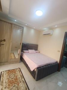 Ένα ή περισσότερα κρεβάτια σε δωμάτιο στο Golf Porto Marina Studio +6 φωτογραφίες