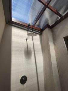 a window in a room with a ceiling at Villa Lovecho in Canggu