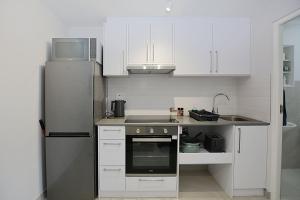 Kuchyň nebo kuchyňský kout v ubytování Apartment-Bachelor-Leetch Views + 2 fotografie