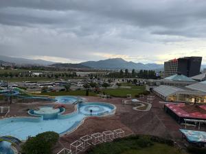an aerial view of a resort with two pools at River Walk Sarajevo-Ilidza Best Apartman in Sarajevo