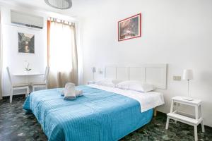 Posteľ alebo postele v izbe v ubytovaní Inlaguna