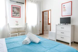 Posteľ alebo postele v izbe v ubytovaní Inlaguna