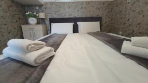 Postel nebo postele na pokoji v ubytování Apartment deluxe Ina FREE PARKING