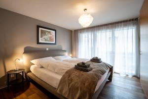 Postel nebo postele na pokoji v ubytování Mera Peak Prime Apartment
