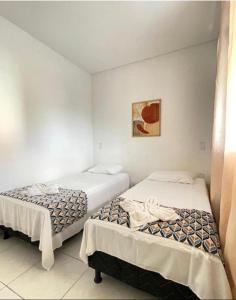 Postel nebo postele na pokoji v ubytování Pousada Casa Apoena