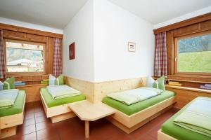 Katil atau katil-katil dalam bilik di Chalet Pienz