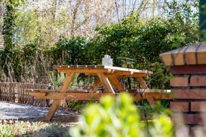Un jardín fuera de Gite Moments à Soy