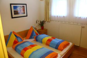 Postel nebo postele na pokoji v ubytování Appartement Asitz