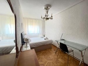 Ένα ή περισσότερα κρεβάτια σε δωμάτιο στο Apartamento Torrebermeja
