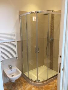 a bathroom with a shower and a sink at Casalbergo in Siena +32 photos