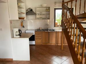 Kuchyňa alebo kuchynka v ubytovaní Apartment Lenka