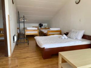 Posteľ alebo postele v izbe v ubytovaní Apartment Lenka