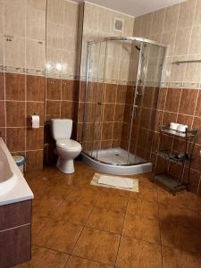 Kúpeľňa v ubytovaní Apartamenty Centrum + 37 fotografií