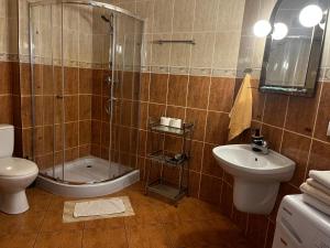 Kúpeľňa v ubytovaní Apartamenty Centrum