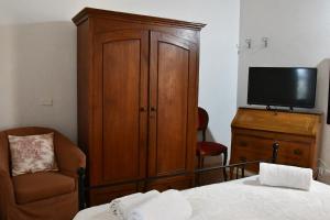 TV a/nebo společenská místnost v ubytování appartamento gelsomino + 15 fotografií
