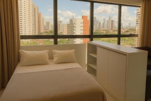 Cama ou camas em um quarto em Reserva Madero Loft Natal Hotel mais 32 fotos