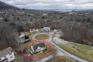 an aerial view of a house with a red circle at Sea Fog Cottage in Camden